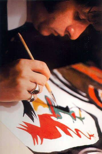 Ringo Starr painting a canvas
